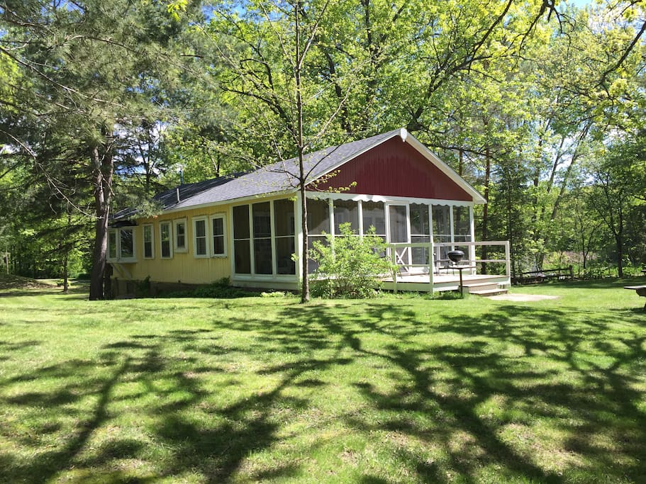 Full screened in porch overlooking the lake.