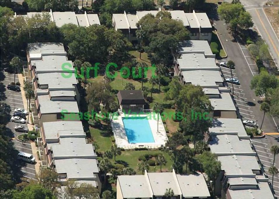 Aerial view of Surf Court, where our quiet condo is next to the pool on the left.