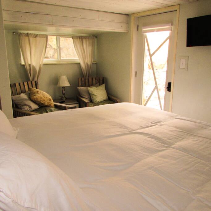 The Chestnut Suite has a king sized bed with sitting area in the bedroom