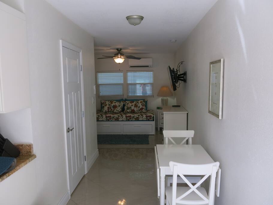 View from the front door - small kitchen is to the left and bathroom is behind the door on the left.