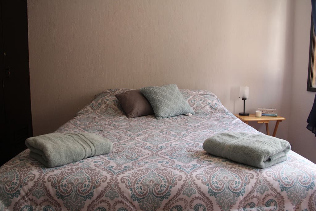 Private bedroom has wardrobes to store belongings and hang clothes