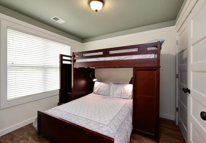 The second bedroom has a full bed and upper twin bed and large closet.