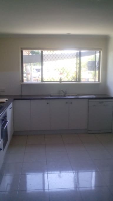 Huge kitchen with dishwasher and all cooking appliances