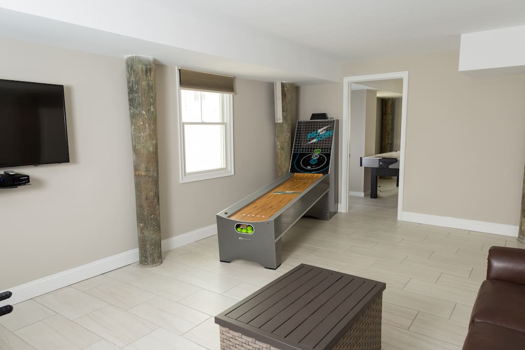 Game room with skee ball, air hockey and foosball