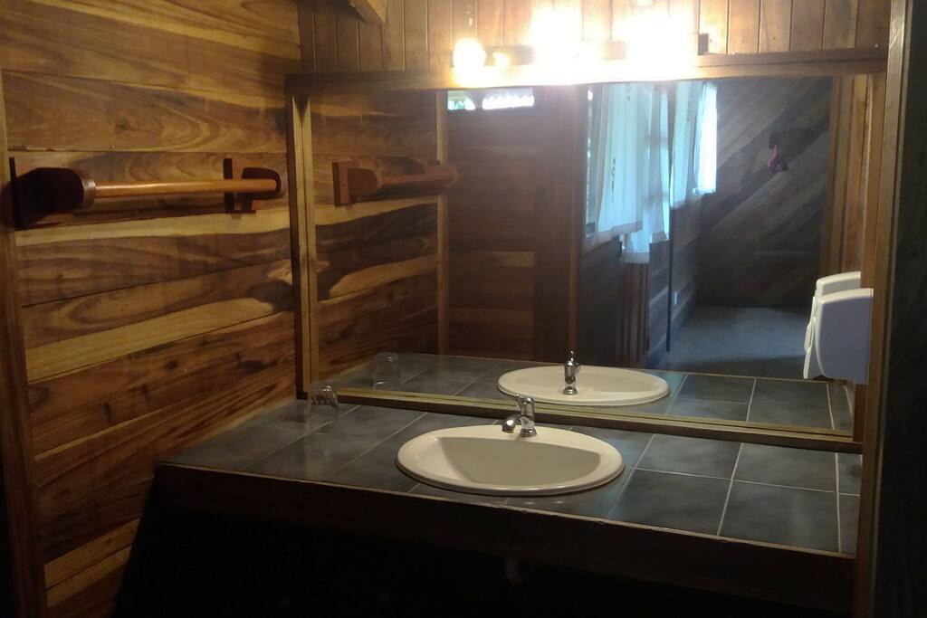 Private bathroom separated from the shower
