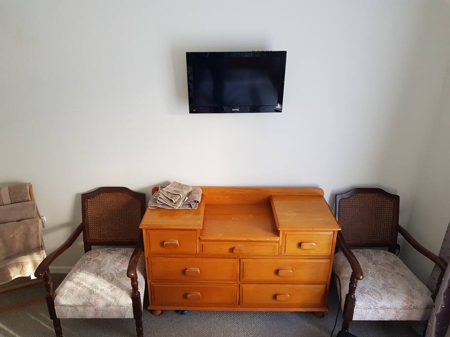 Your chest of drawers, reading chairs and 22" Freeview Television/DVD player