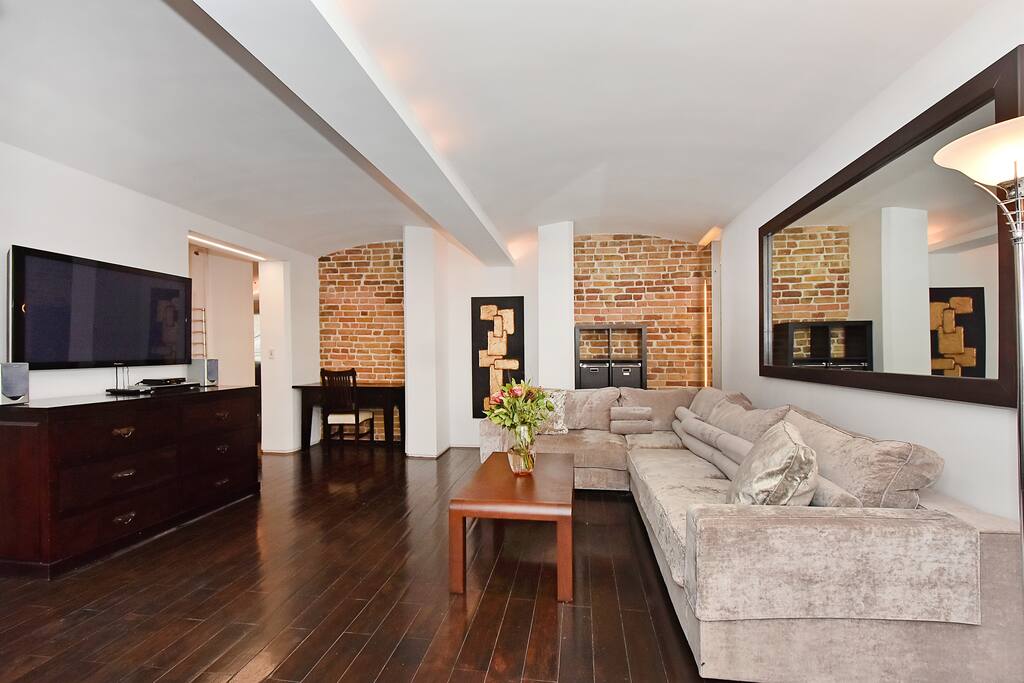 The chic, elegant and spacious Lounge with desk
