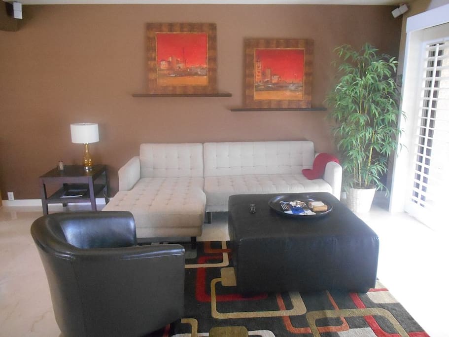 Living Room with Tons of Natural Light and Large Sectional