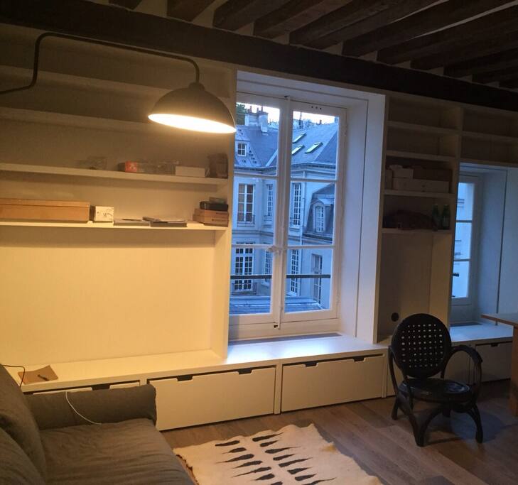 2 large windows with a great view Parisian roofs