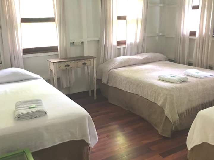 The bedrooms have 3 queen beds each to grant enough space and comfort for everyone in your party