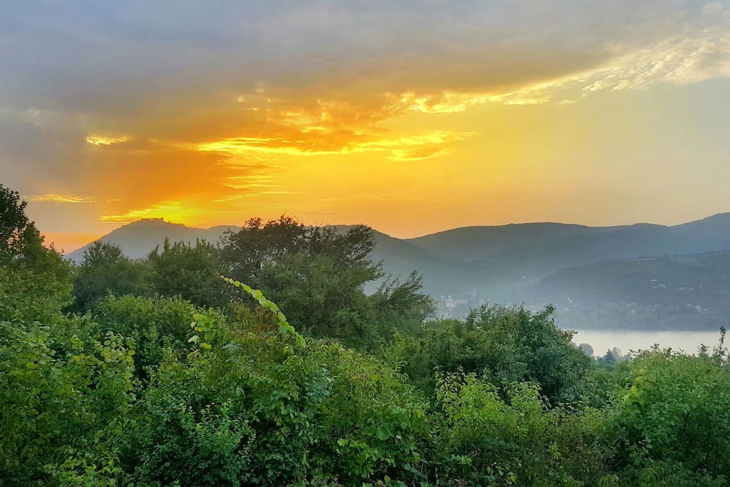 Morning from the terrace to Visegrád, with the Danube and the mountains.