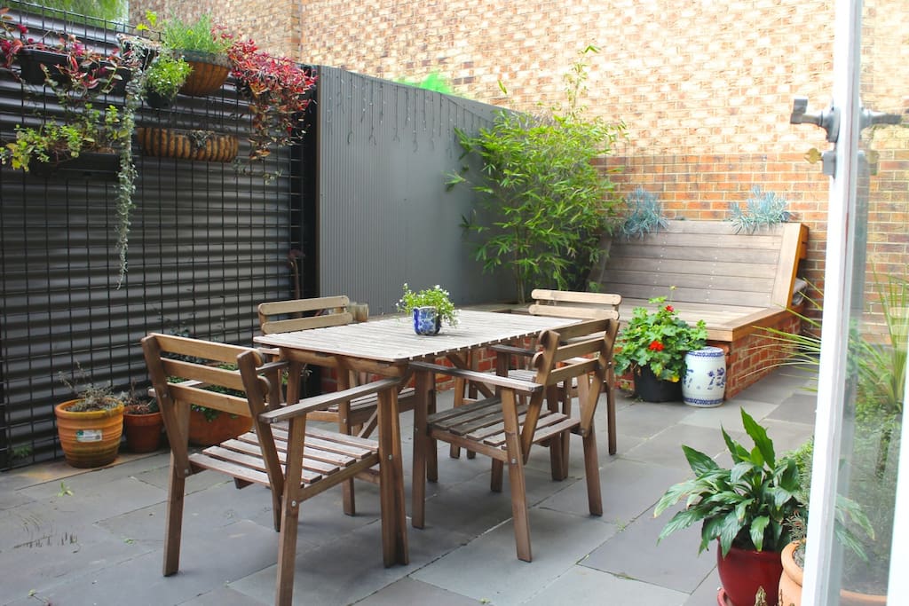 French doors from the lounge room open up to the large courtyard outside