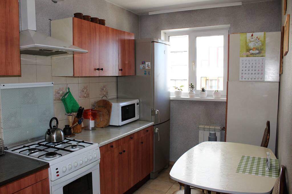 Kitchen: Fridge, microwave, kettle