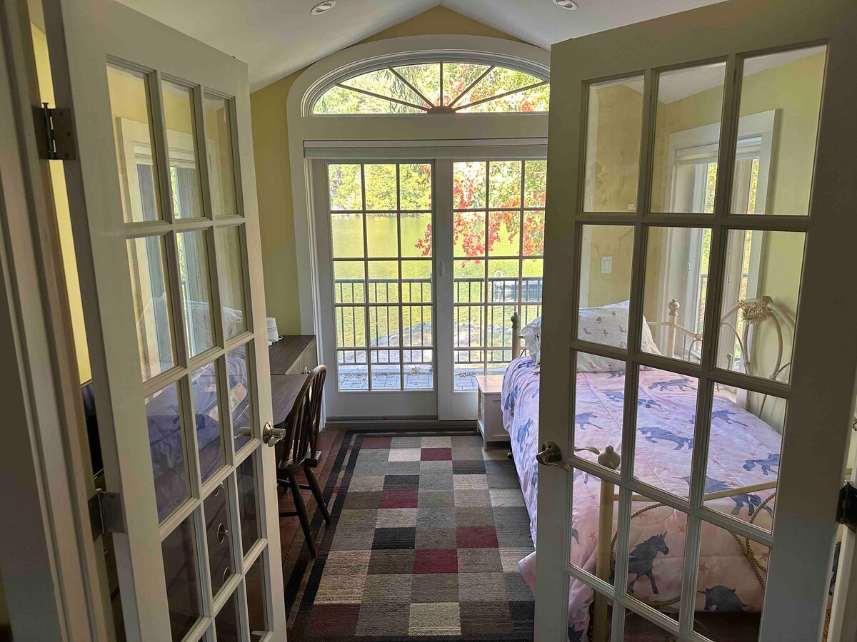 A view of office, bedroom 3 with balcony sliding door access 