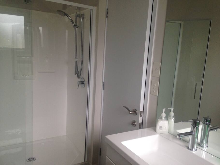 Part of en-suite shower room attached to the bedroom