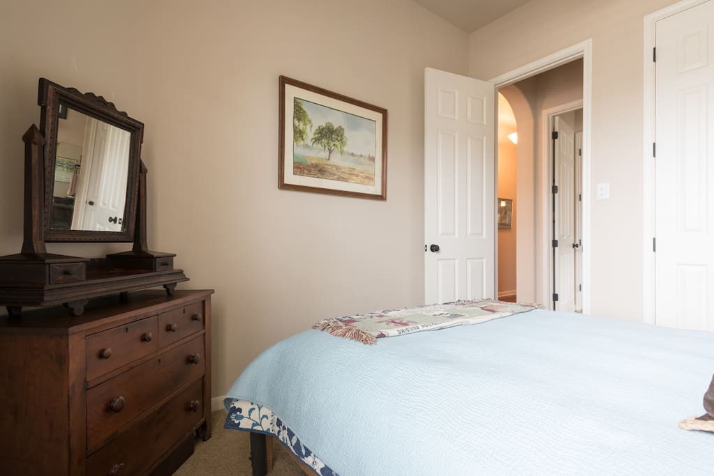 Bedroom with queen bed.