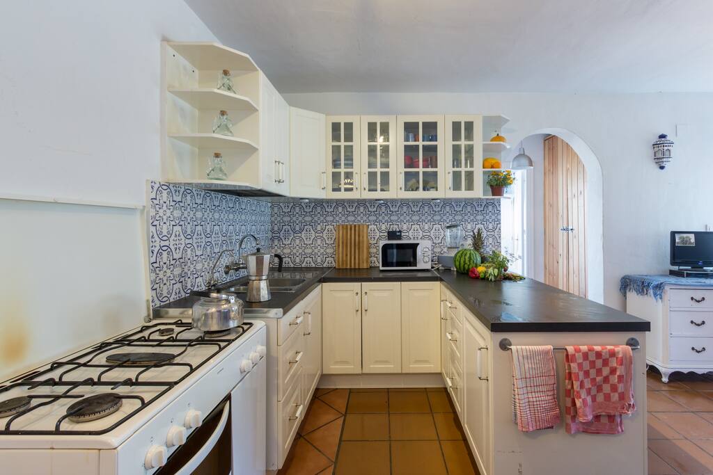 with adjacent kitchen