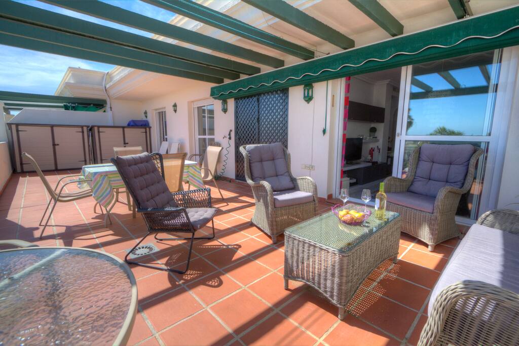 Outside lounge with sea views