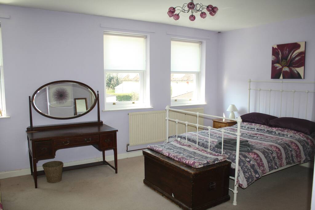 The double bed and dresser