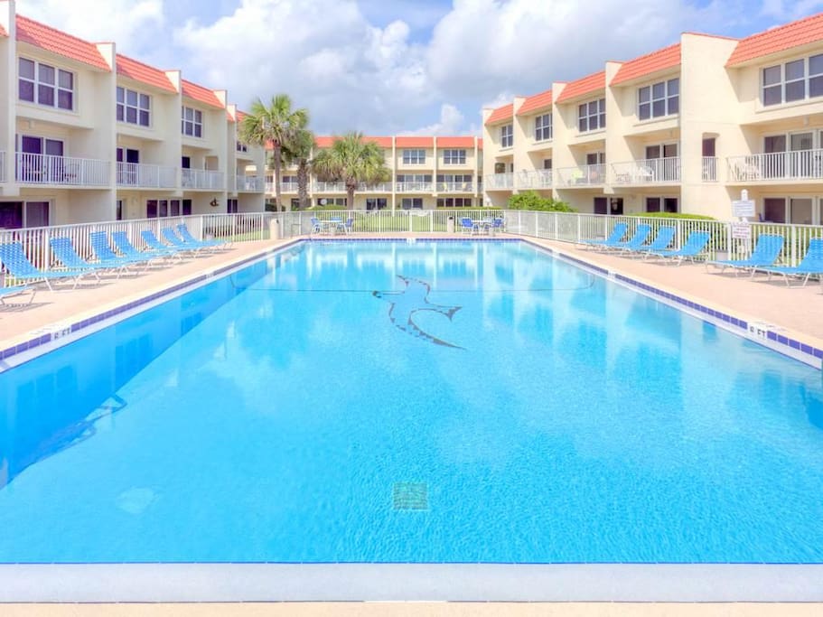 Lounge by the pool or jump in--the water's fine! - Keep an eye on the Atlantic ocean as you swim in the oceanfront pool. This is