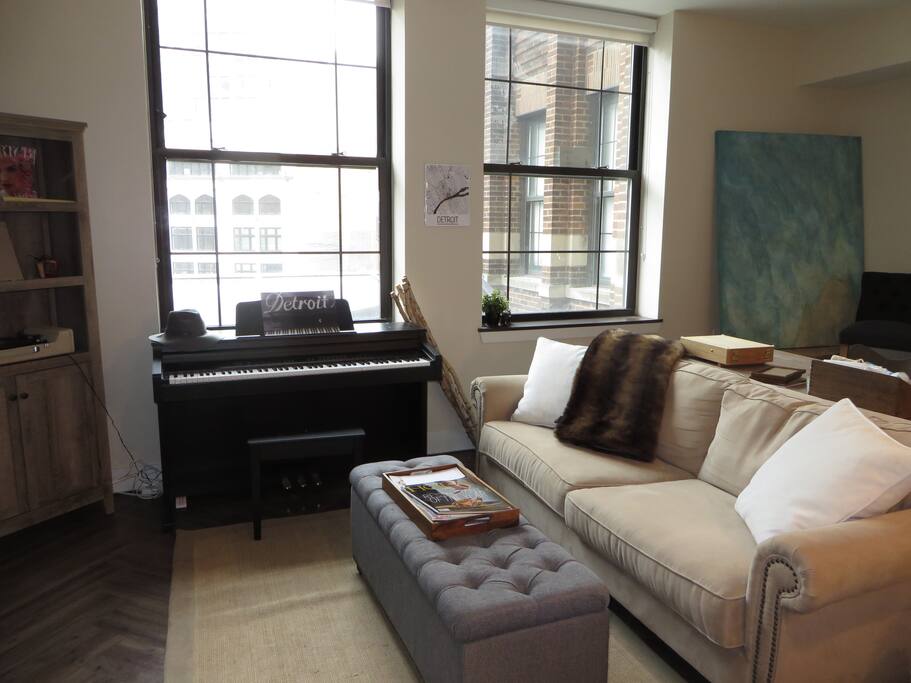 Creative space with dramatic windows, natural light, artwork, and more