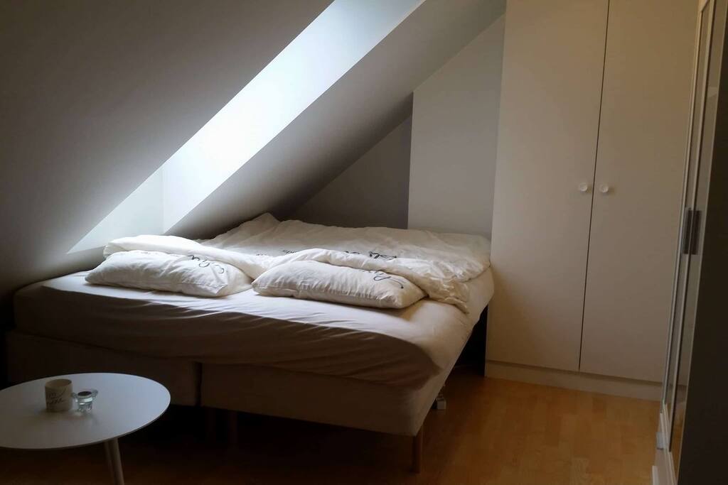 Bright room, but can be totally dark with curtains