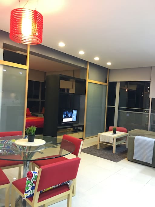 Spacious living and dining area with plenty of lights n mirrors :)