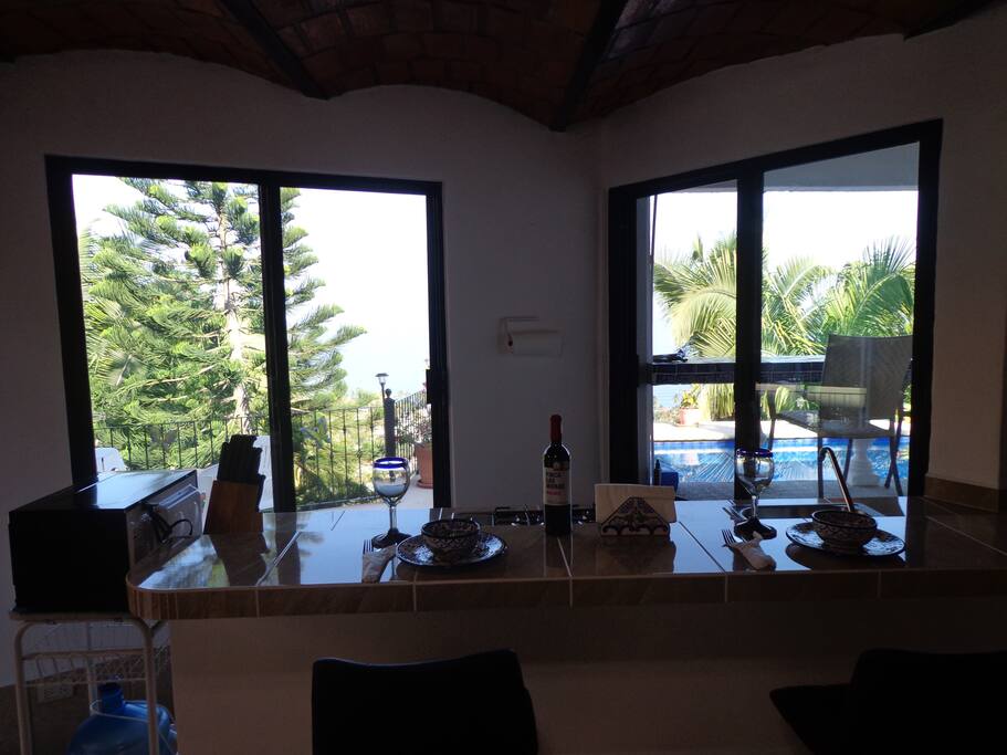 bar/kitchen has pass through window to outside bar balcony