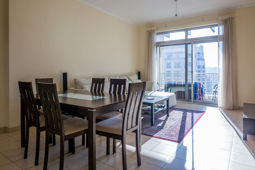 Lots of sunshine in a spacious living room.