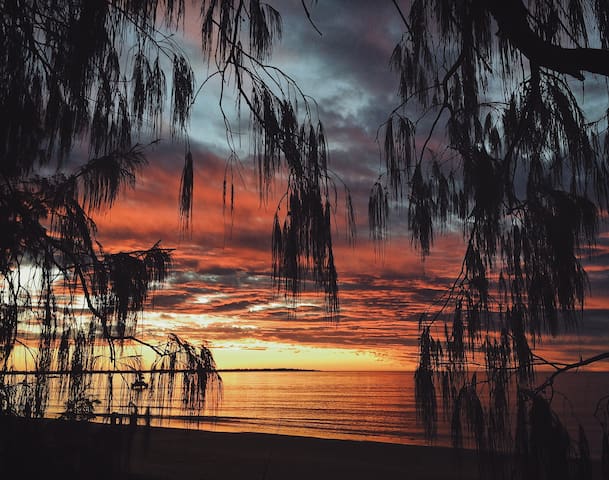 Watch the sunset on the beach.