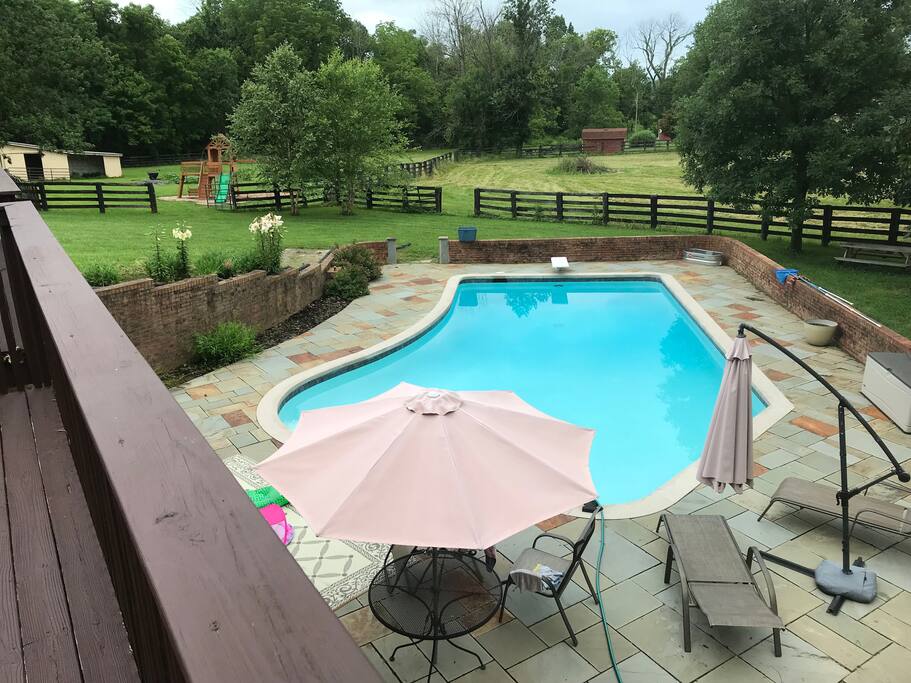 4 Bedroom House with Pool on 5 acres. Two rooms are set up for a small kids(Toddler/infant) with large play area in the basement. Fresh garden vegetables and eggs from the chickens. Local parking passes and walking distance to golf course. Perfect place for families and kids.