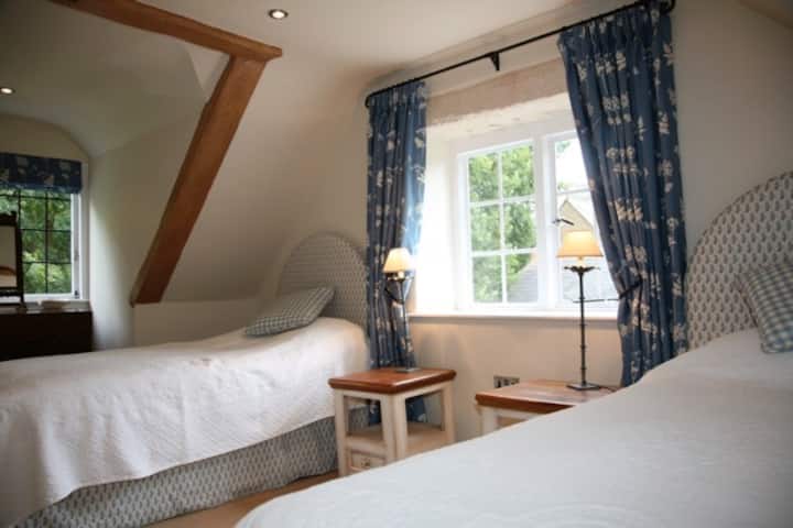 Twin bedroom - next to family bathroom - (bath with shower and toilet heated towel rail)