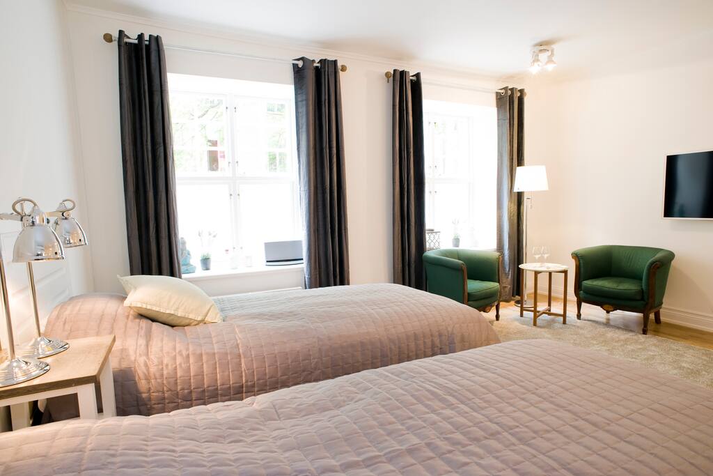 Large windows with black-out curtains