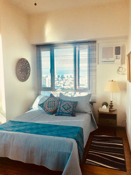 A touch of Filipino culture is evidenced in this bedroom setting.