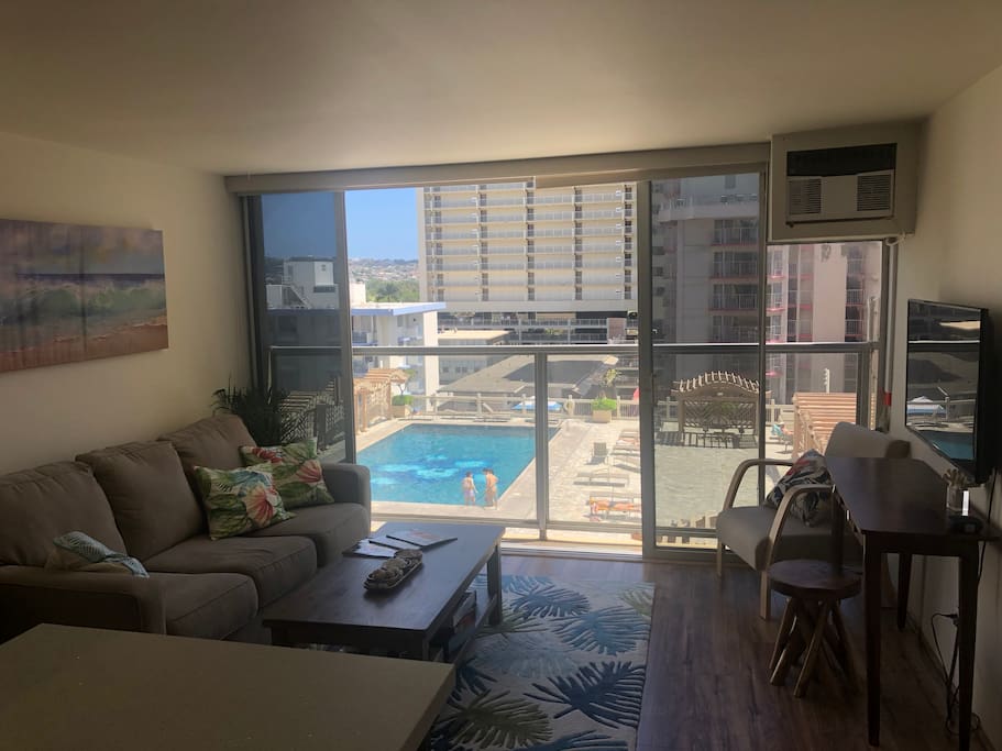 LIVING ROOM AND POOL VIEW