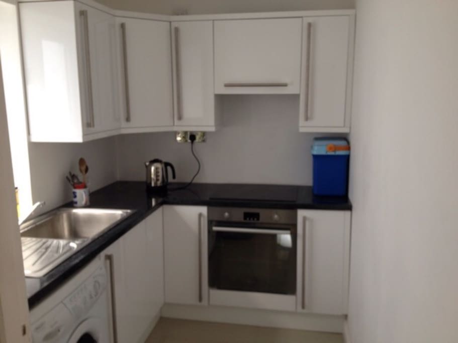 Newly fitted kitchen with new hob and electric oven