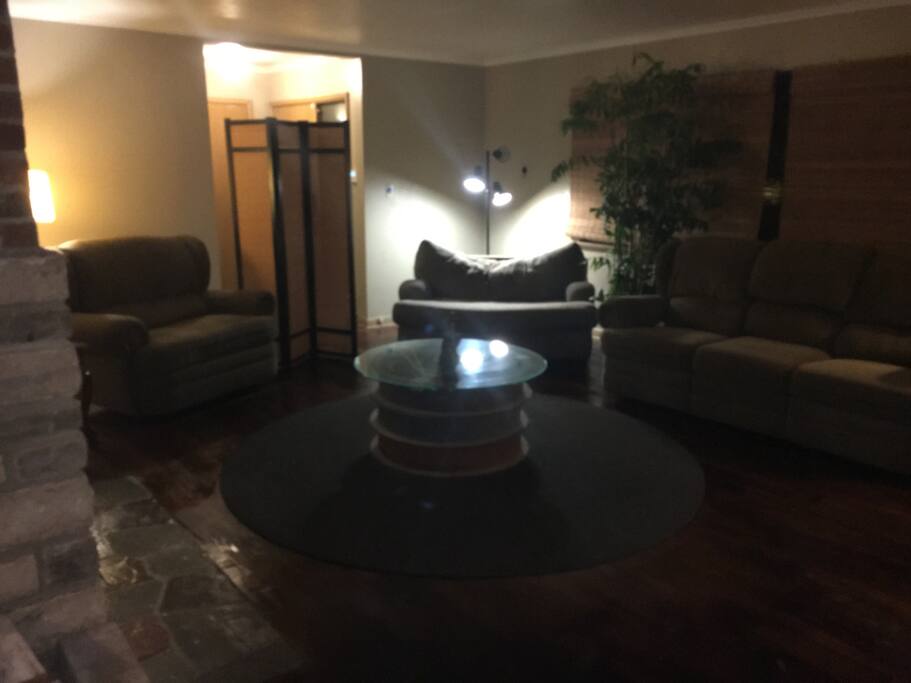 Living room with 2 comfy couches.