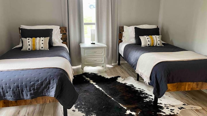 Two twin XL for the taller ones with cool cotton sheets and down alternative comforters. Satin smooth finished pillow cases make it special and extra pillows in the closet will assure your favorite comfort level. 