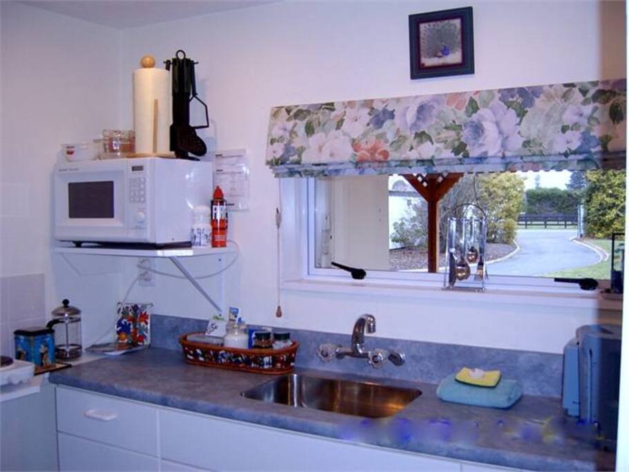 Kitchen with Microwave Hotplates & Saucepans etc Full size Fridge Freezer