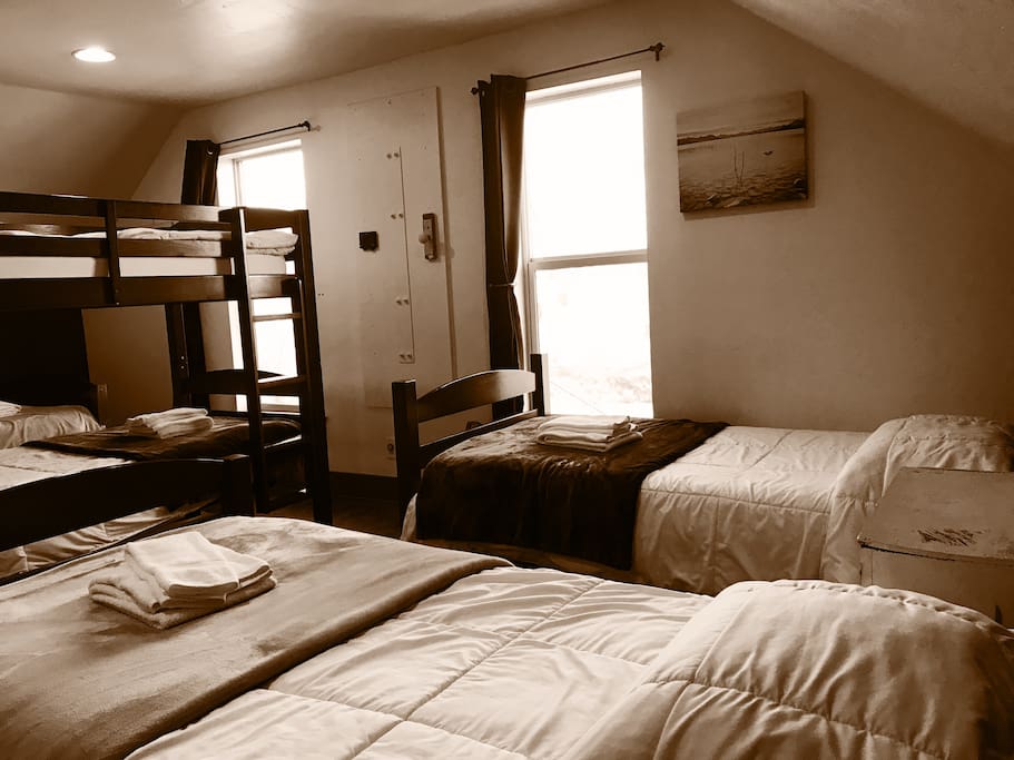 7-bed dorm room; 2 beds are not shown in the picture. (Upstairs)