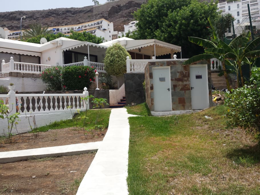 There is a WC near the swimming pool