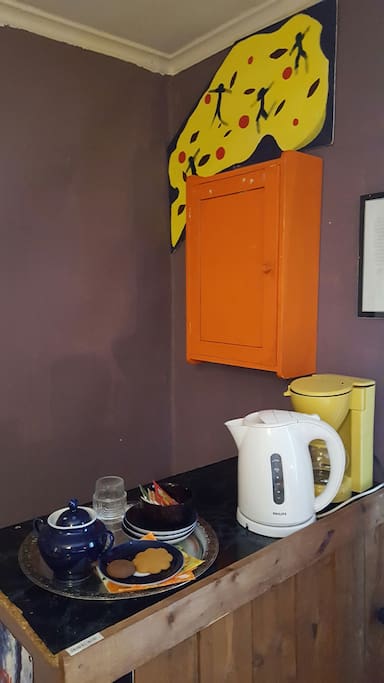 Room1. Is equipped with electric kettle and a coffee maker.