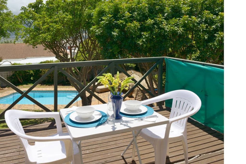 Or you can set up the table on your own private deck upstairs and enjoy the mountain and sea views