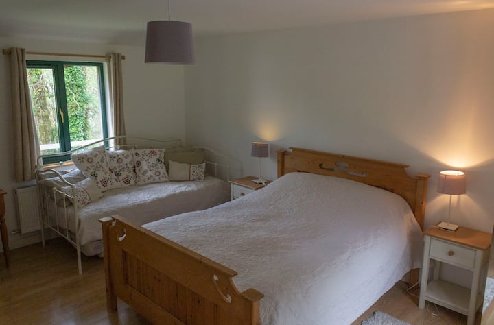 Bedroom 3, with 1 double bed, 1 single bed, 1 pull-out bed and ensuite shower and toilet
