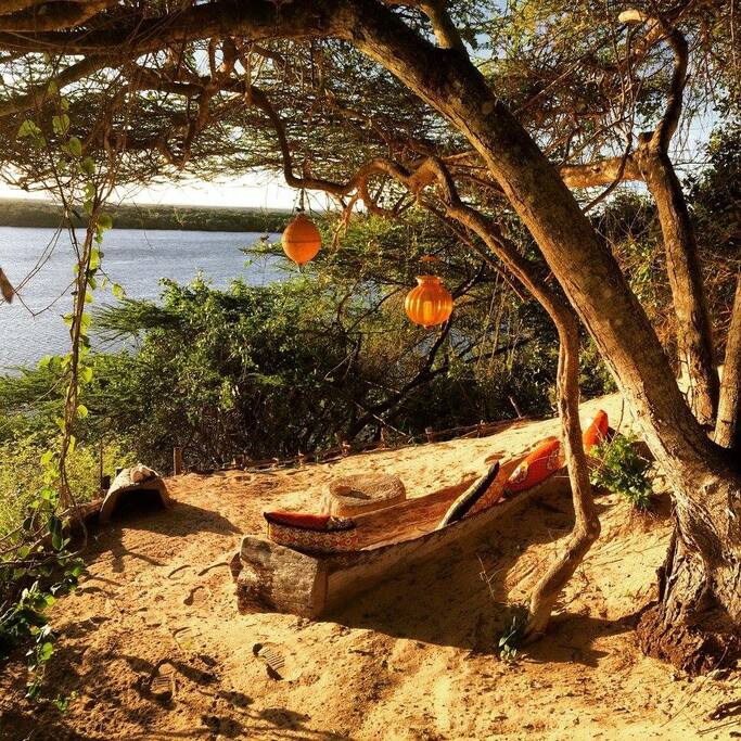 Sundowner platform. where you can veiw all creek activity below, waterskieng, dolphins passing, dhows under sail fish and turtles is the shallows below, vervet monkeys catching crabs on the beach and a platform to enjoy exquisite sunsets with Swahili tapas and cold drinks.