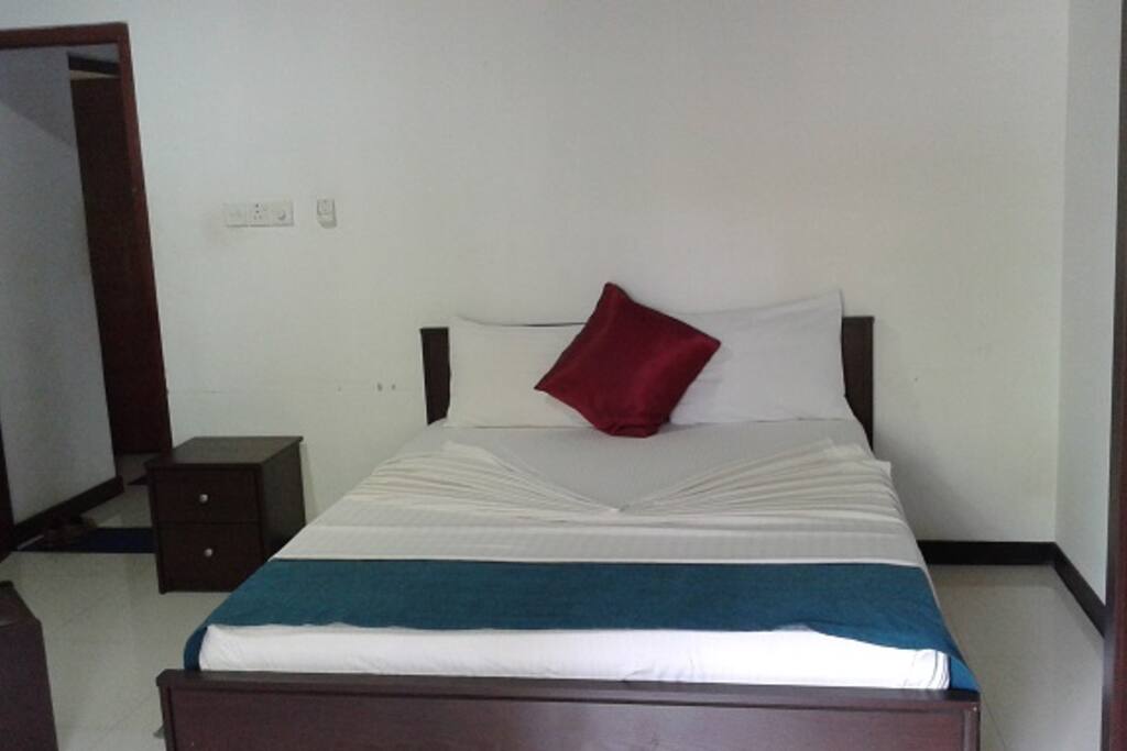 clean white linen on the double bed