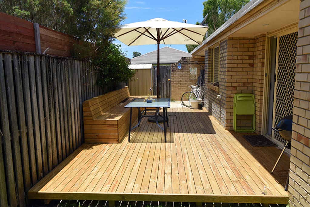 Back deck area with umbrella