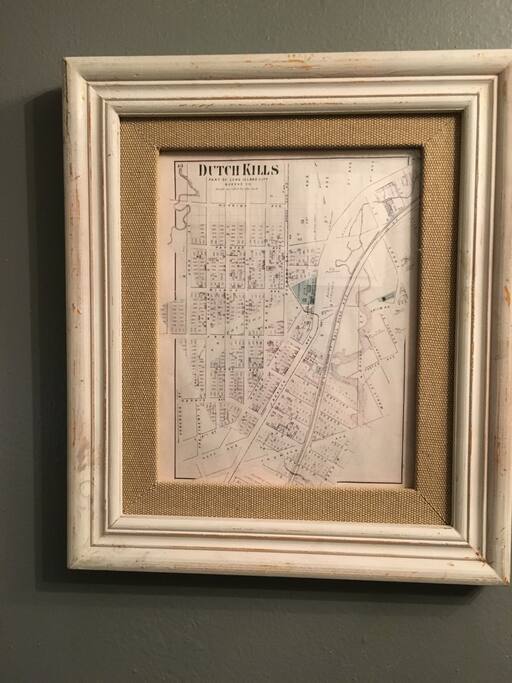 Entryway art and old map of the 'Dutch Kills' neighborhood