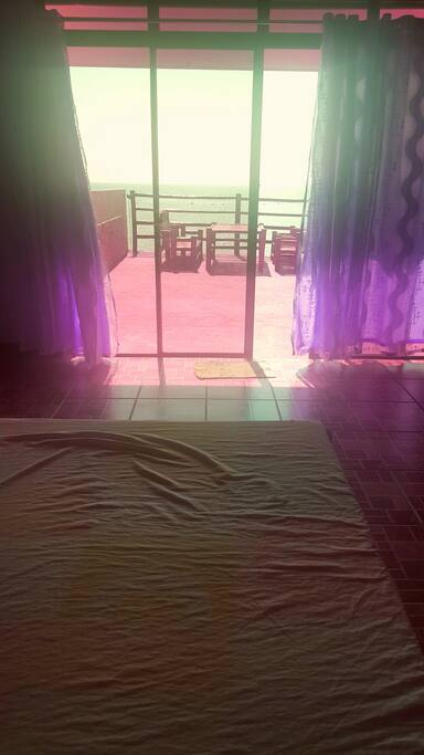 Bedroom with view of the beach