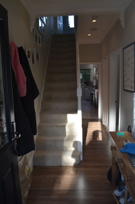Ground floor - The entrance and stairs. Plenty of room for coats!